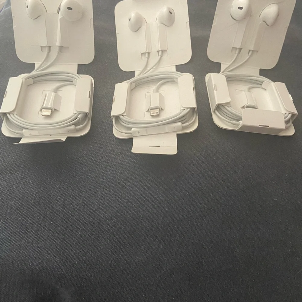 3 pair Apple earbuds.